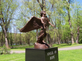 The Angel of Hope Memorial is a one of a kind cast bronze sculpture atop an all polished Imperial Black Pedestal.  The Angel of Hope Memorial is located in Port Dickenson, NY